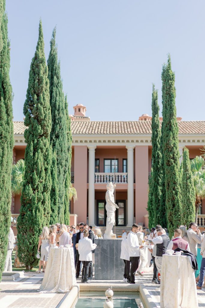 Marbella wedding venue outdoor courtyard reception with fountains and statue 
